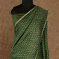 OLIVE GREEN SHADE WITH ASCENDING OFF-WHITE MOTIFS PRINTED TUSSAR SILK SAREE