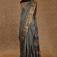 GREY WITH GOLDEN BORDER AND FLORAL PRINTS TUSSAR SILK SAREE