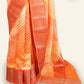 ORANGE AND RED CHANDERI SAREE WITH GEOMETRIC DESIGNS AND ANTIQUE GOLD ZARI BORDERS