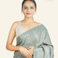 GREYISH GREEN TUSSAR SILK SAREE WITH LEHARIYA STYLED PRINTING AND MIRROR WORK BORDERS