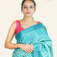 BRIGHT TURQUOISE TUSSAR SILK SAREE WITH MAGENTA SHADED PALLU AND SHIBORI DESIGNS