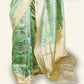 GREEN BANARASI TISSUE SAREE WITH IKAT INSPIRED WEAVING