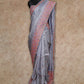 BLUISH GREY WITH PEACH EMBROIDERED BORDERS TUSSAR SILK SAREE