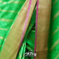 GREEN BANARASI TUSSAR SAREE WITH DIAGONAL LINES AND ANTIQUE GOLD ZARI BORDER