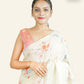 CREAMY YELLOW LINEN SAREE WITH ALL OVER SEQUINS WEAVING AND MULTICOLORED FLORAL PAINTED DESIGNS